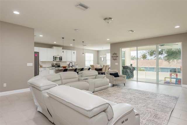 living room featuring sink