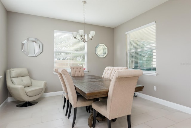 dining area with a chandelier