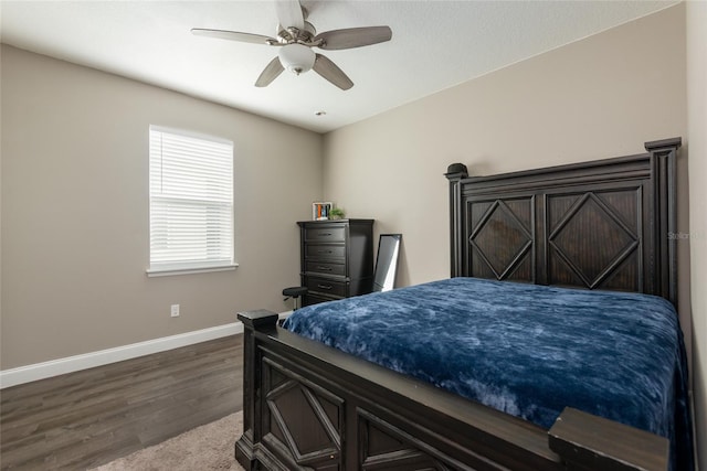 bedroom with ceiling fan and hardwood / wood-style floors