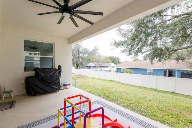 view of patio / terrace featuring ceiling fan