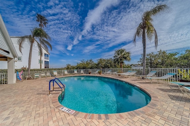 view of pool featuring a patio area