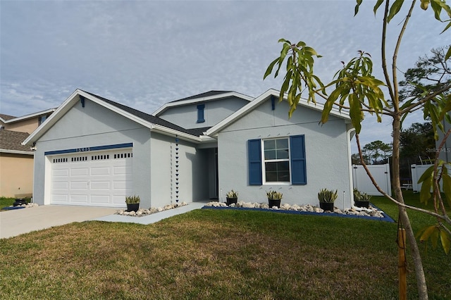 view of front facade featuring a front lawn and a garage