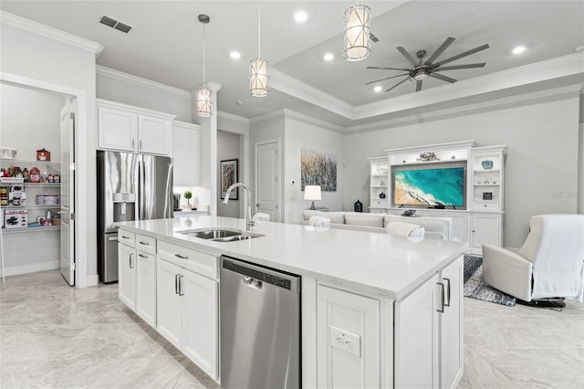 kitchen with stainless steel appliances, open floor plan, visible vents, and a sink