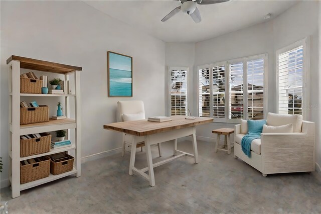 home office featuring baseboards and a ceiling fan