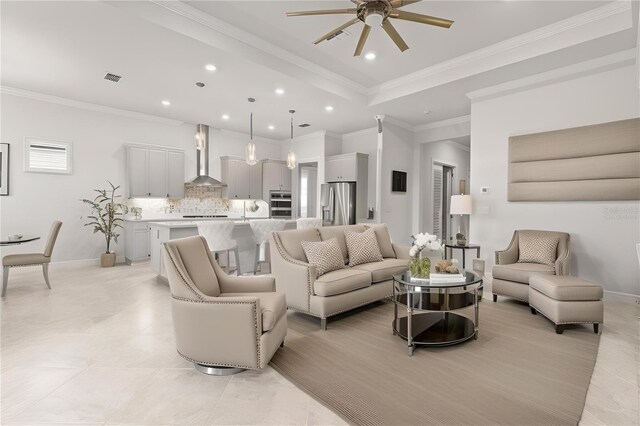 living room featuring baseboards, visible vents, ornamental molding, and recessed lighting