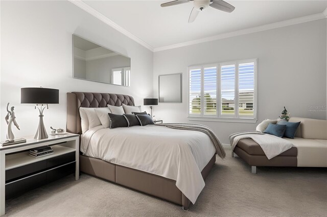 bedroom with crown molding, baseboards, a ceiling fan, and light colored carpet