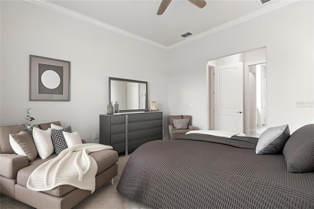 carpeted bedroom with a ceiling fan, visible vents, and crown molding