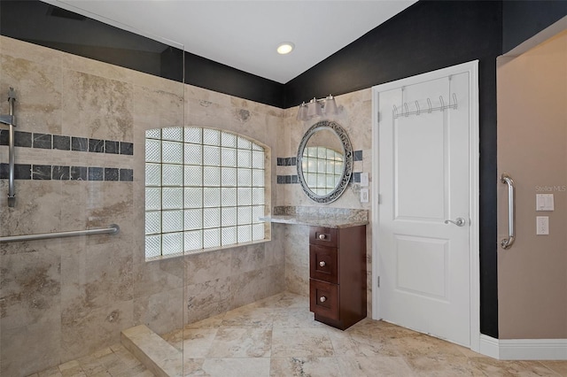 bathroom featuring vaulted ceiling and walk in shower