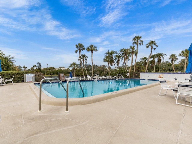 view of pool featuring a patio