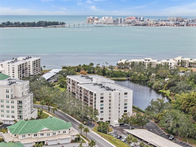 birds eye view of property featuring a water view