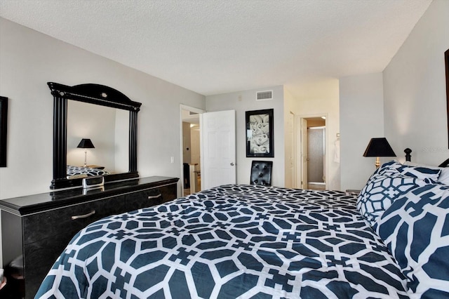 bedroom with a textured ceiling