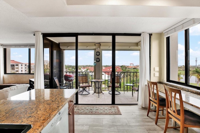 entryway with a textured ceiling