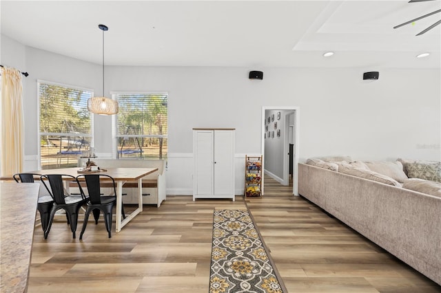 dining space featuring ceiling fan and hardwood / wood-style floors