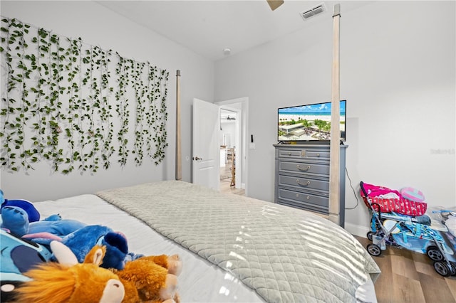 bedroom featuring hardwood / wood-style flooring