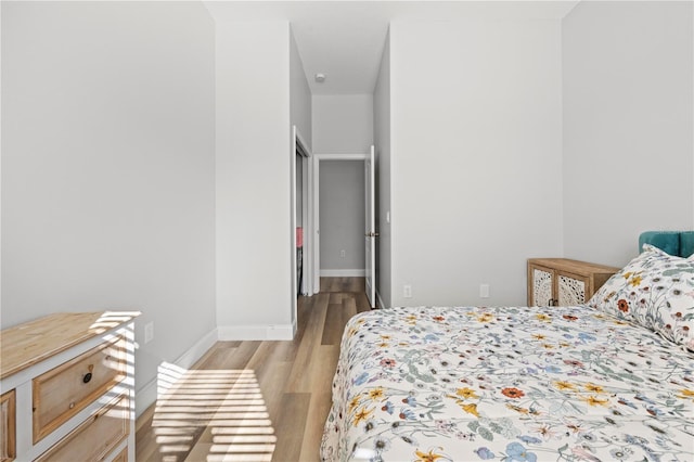 bedroom featuring light wood-type flooring