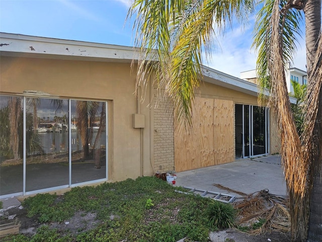 rear view of house with a patio area