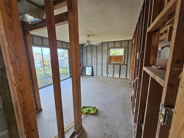 interior space with a healthy amount of sunlight and a textured ceiling