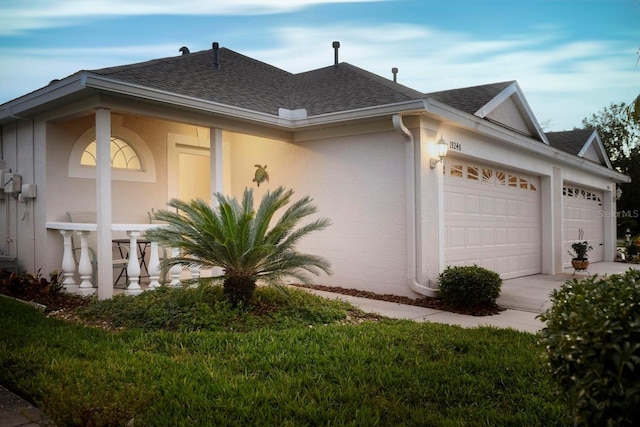 view of side of property featuring a garage