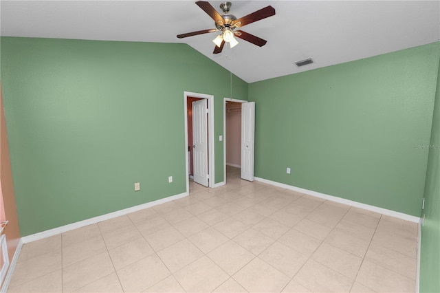 interior space featuring ceiling fan and vaulted ceiling