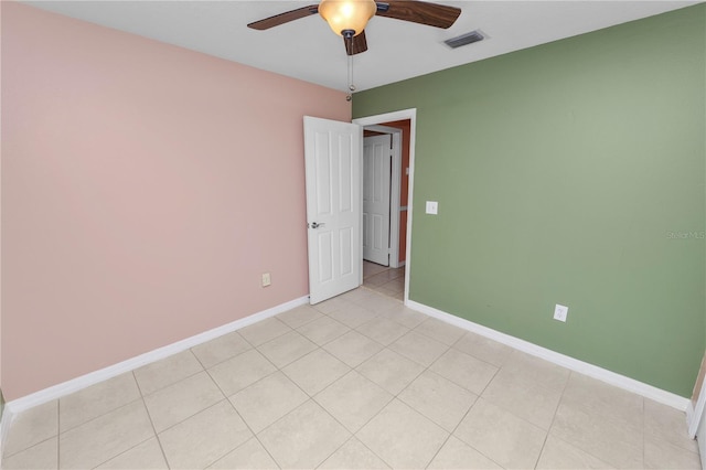 spare room with ceiling fan