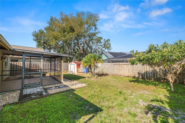 view of yard featuring a storage unit