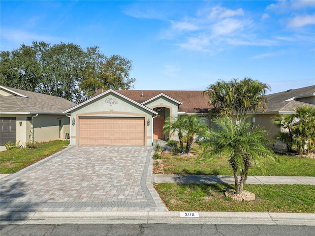 ranch-style house featuring a garage