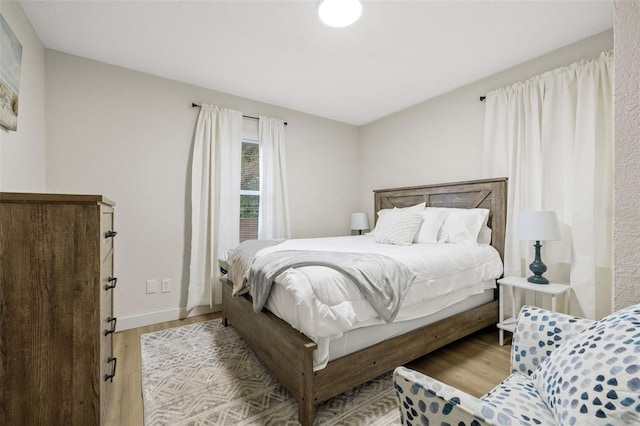 bedroom featuring light wood-type flooring