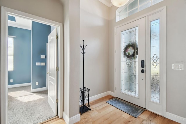 entryway featuring light hardwood / wood-style flooring and a wealth of natural light