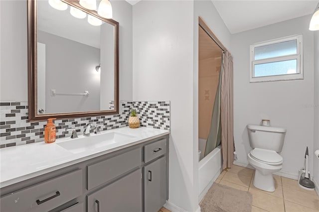 full bathroom with toilet, vanity, tile patterned flooring, backsplash, and shower / bathtub combination with curtain