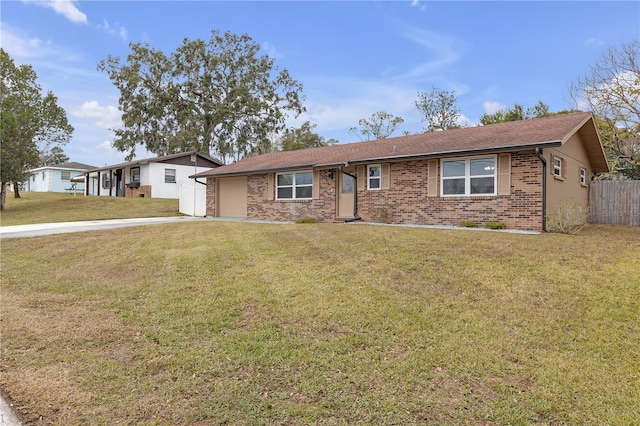 ranch-style house with a front yard