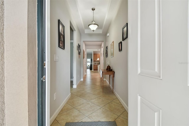 corridor with light tile patterned flooring