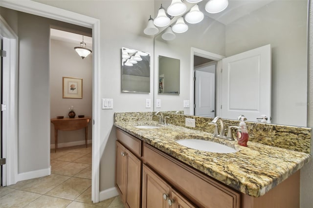 bathroom with tile patterned floors and vanity