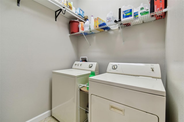 laundry area with separate washer and dryer