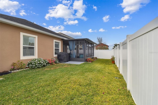 view of yard featuring a sunroom