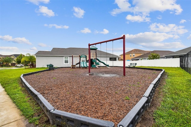 view of play area featuring a lawn