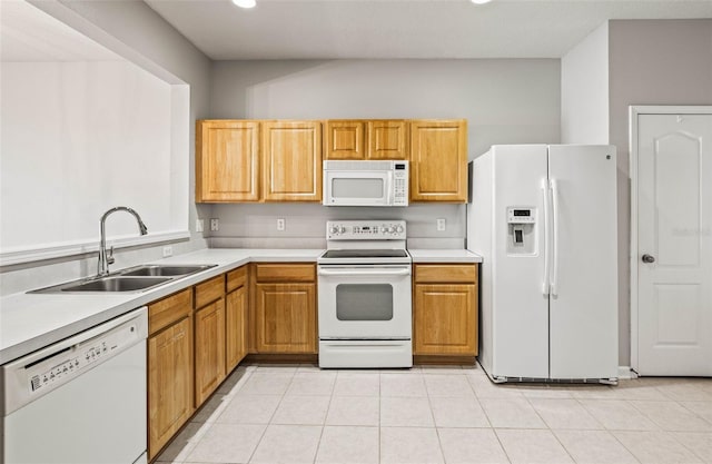 kitchen with sink and white appliances