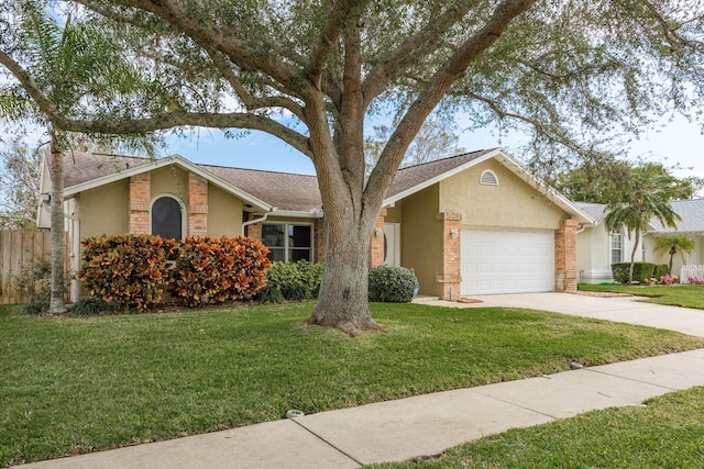 ranch-style house with a garage and a front lawn