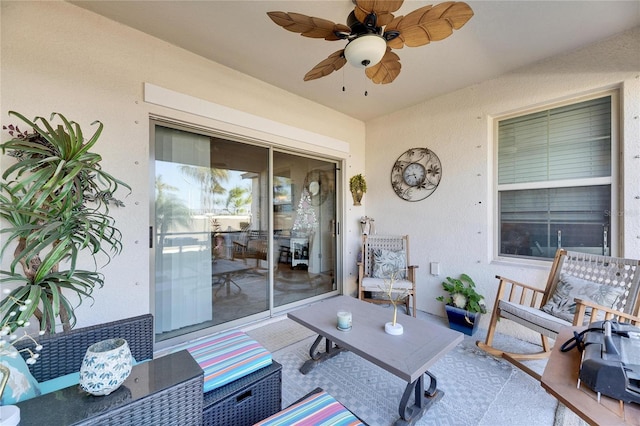 view of patio featuring ceiling fan