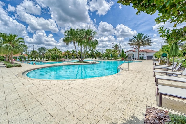 view of pool featuring a patio area