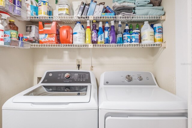 laundry area featuring independent washer and dryer