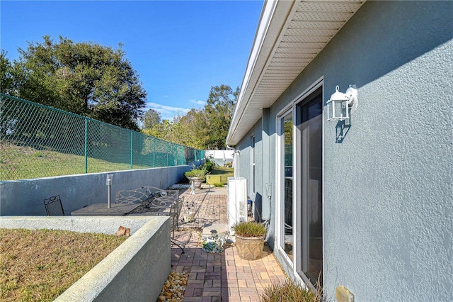 view of home's exterior featuring a patio