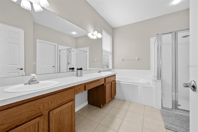 bathroom featuring tile patterned floors, vanity, and independent shower and bath