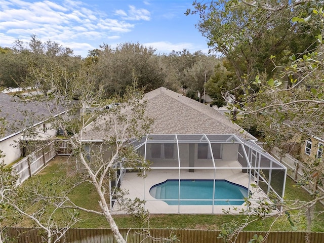 view of pool with a lanai and a patio area