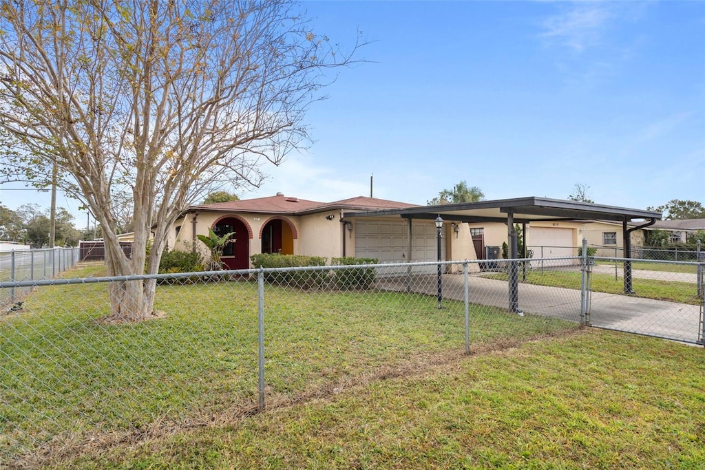 view of front facade with a front lawn and a garage