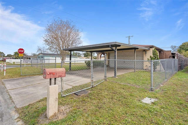 exterior space with a garage and a carport