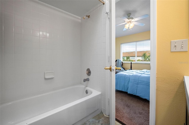 bathroom featuring ceiling fan and shower / tub combination