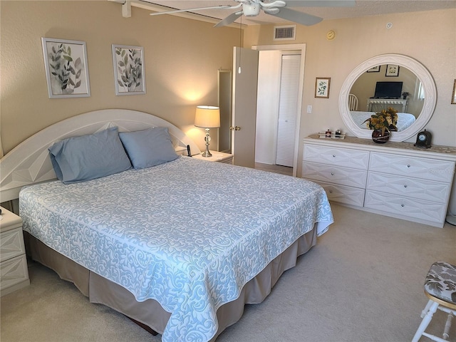 carpeted bedroom featuring ceiling fan