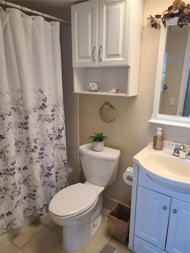 full bathroom with toilet, vanity, shower / tub combo, and tile patterned flooring