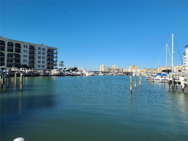 property view of water featuring a boat dock