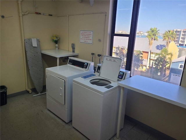 laundry area with washing machine and dryer